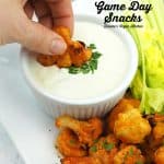 Dipping buffalo cauliflower with 15+ Vegan Game Day Snacks text overlay