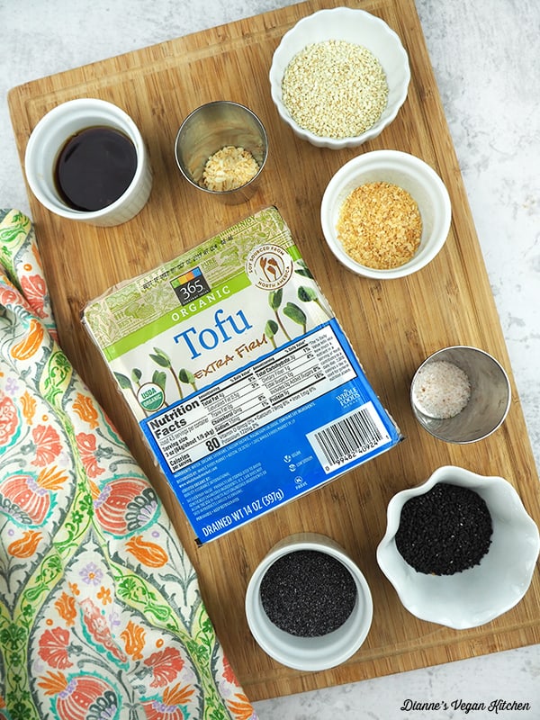 Tofu, tamari, sesame seeds, poppy seeds, onion granules, garlic granules, salt