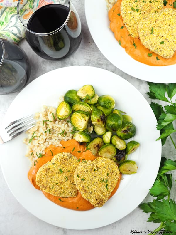 Cornmeal Crusted Tofu from above with rice, sprouts, and wine