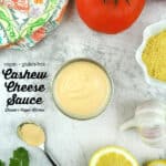 jar of Cashew Cheese Sauce with text overlay