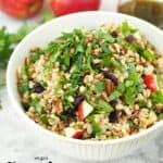 large bowl of farro salad with text overlay