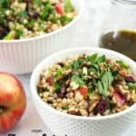 two bowls of farro salad with text overlay