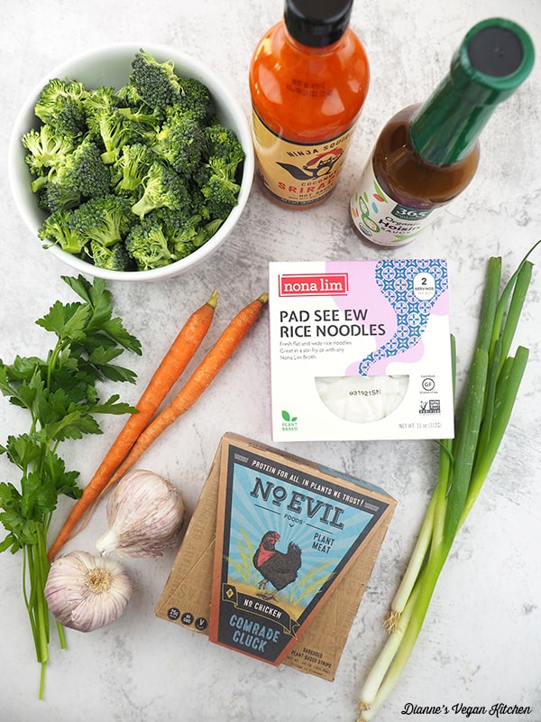 broccoli, hot sauce, hoisin sauce, noodles, seitan, scallions, garlic, and carrots