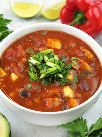 Three Bean Chili with avocado, parsley, lime, and garlic square