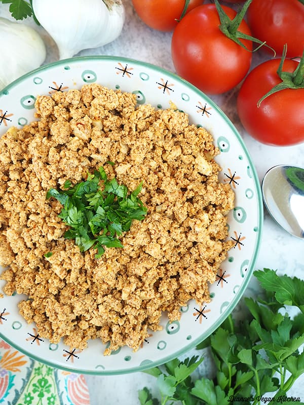 bowl of chorizo with tomatoes and garlic
