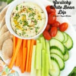 Garlicky White Bean Dip with vegetables with text overlay