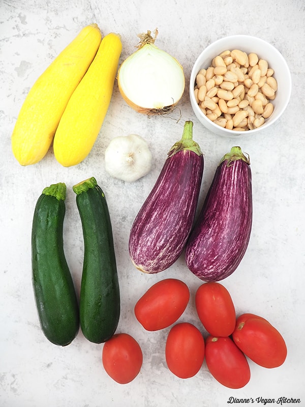 tomatoes, garlic, parsley, eggplant, squash, zucchini, and beans