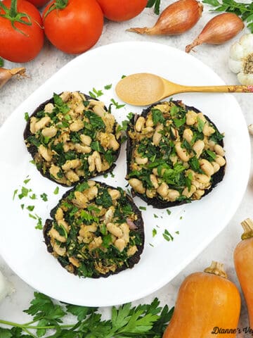 stuffed portobello mushrooms with tomatoes, shallots, mushrooms, garlic, and squash