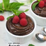 two bowls of mousse with mint and raspberries with text overlay