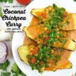 Coconut Chickpea Curry with Spinach over sweet potatoes with text overlay
