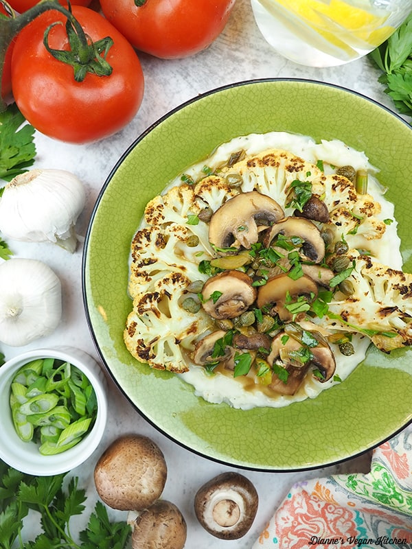 Cauliflower Piccata with tomatoes, mushrooms, garlic, and scallions