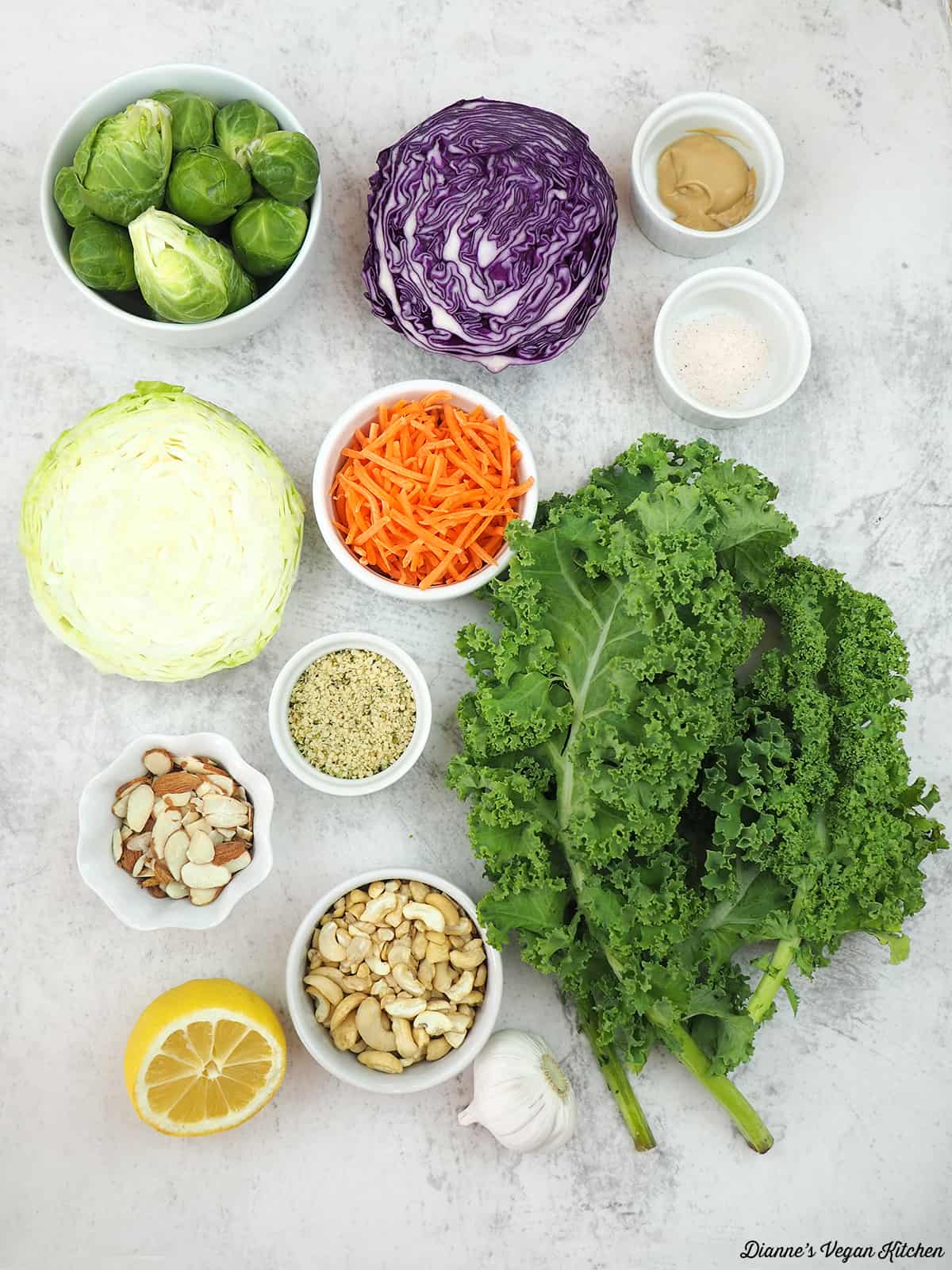 kale, brupsles sprouts, cabbage, almonds, lemon, cashews, mustard, carrots, garlic, hemp seeds