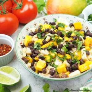 salad with tomatoes, limes, mango, and cilantro