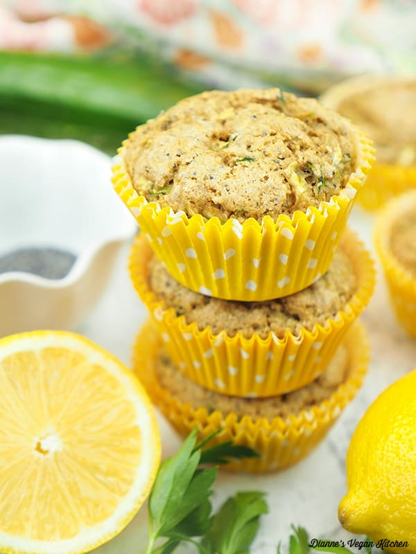 stack of muffins with lemons and zucchini