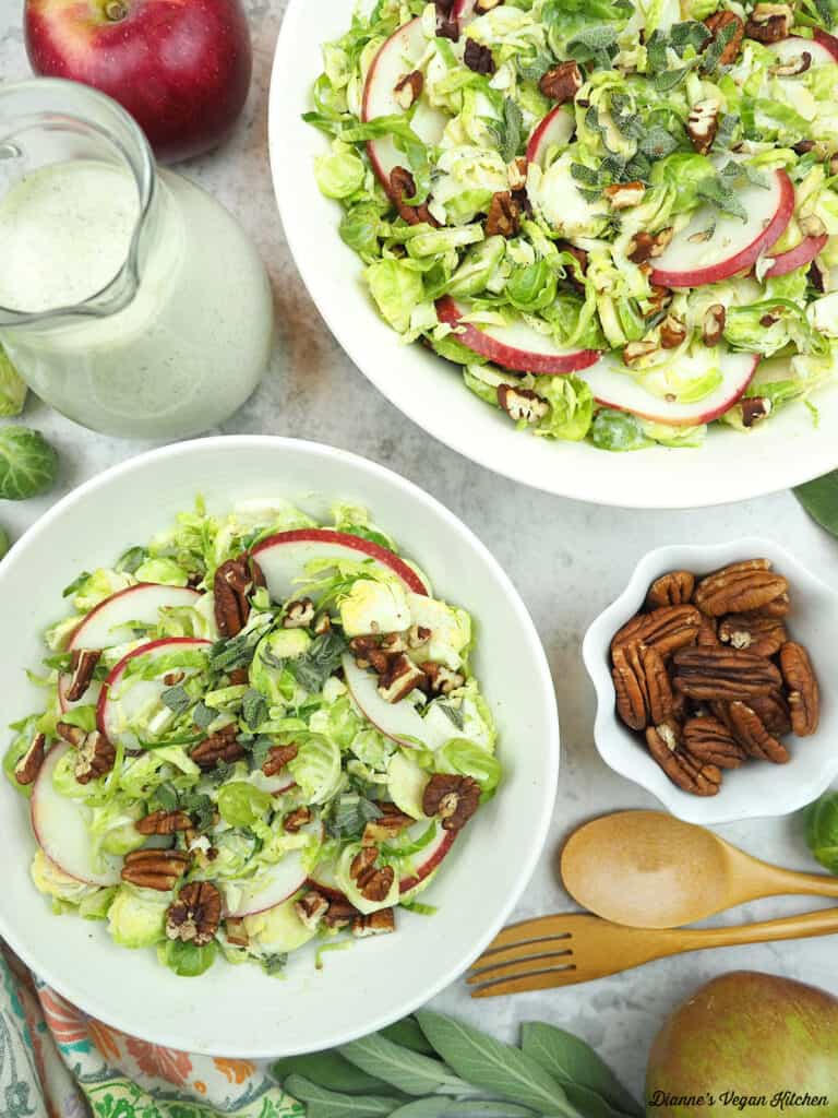Shaved Brussels Sprout with apples, dressing, pecans, and sage
