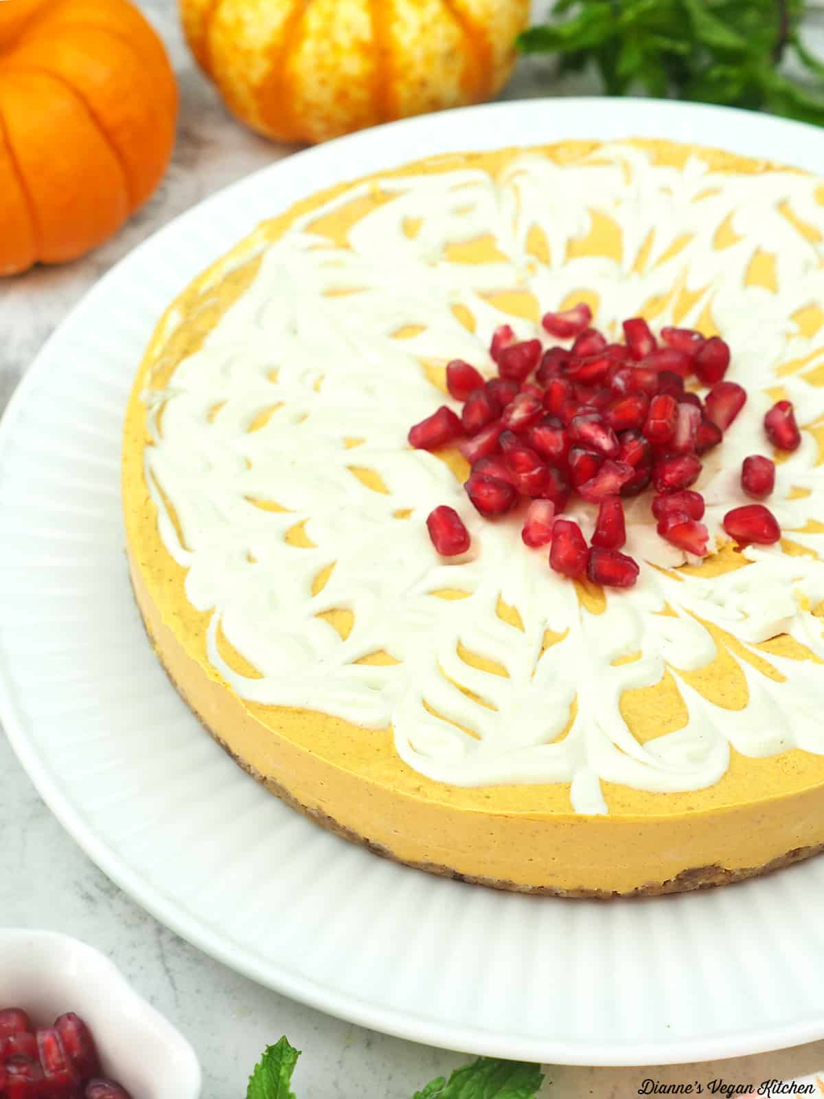 close up of cheesecake with pumpkins