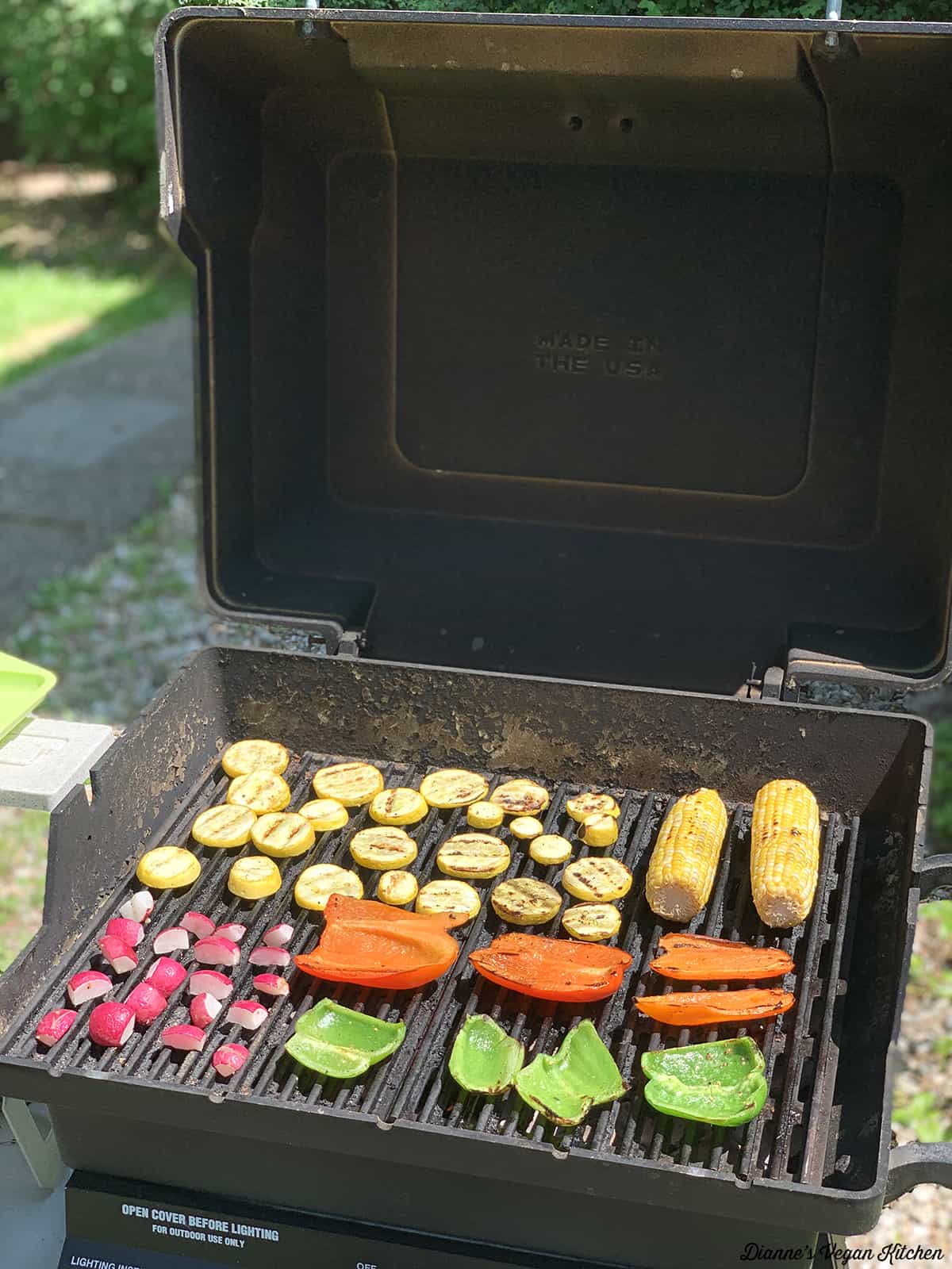 vegetables cooking on the grill outside