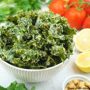 Cheesy Kale Chips with tomatoes and lemon square